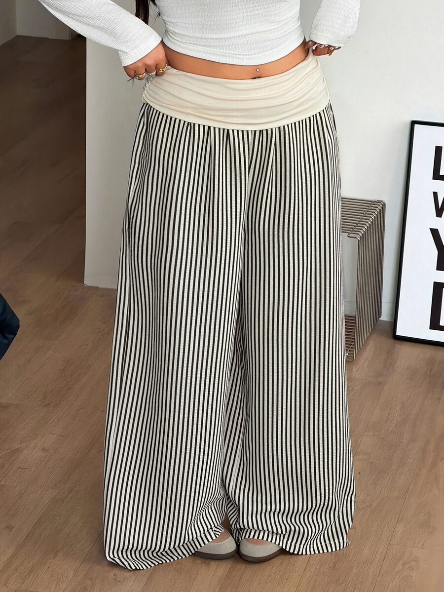 Women's plus size wide leg cotton pants featuring a relaxed loose fit and high waist design.