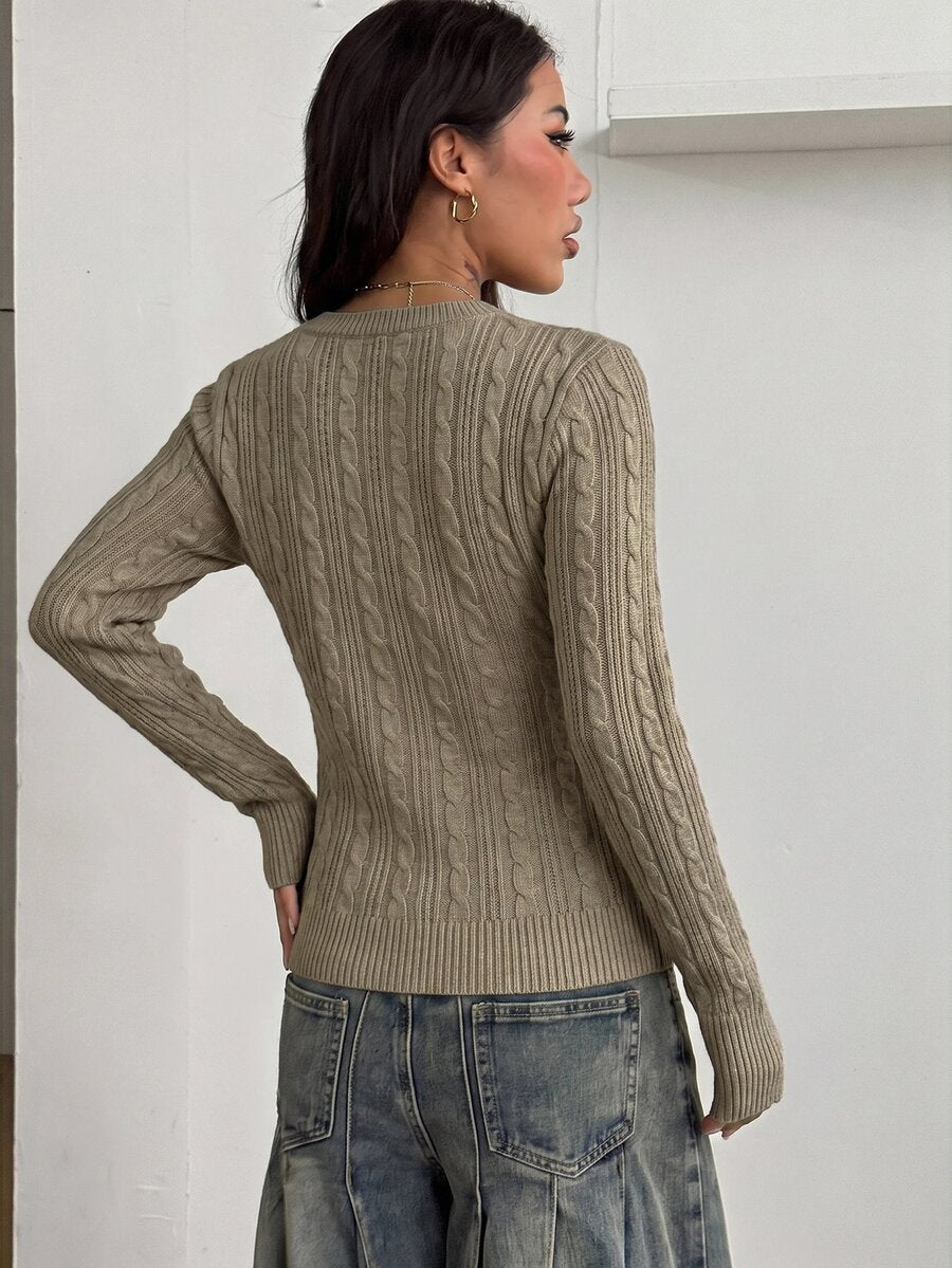 Women's slim fit cable-knit sweater with a V-neckline and long sleeves in solid green rib knit fabric.
