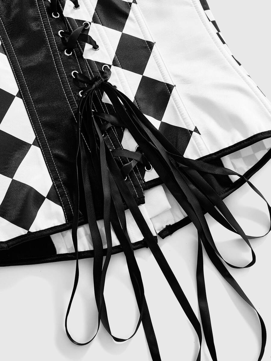 Black and white checkerboard pattern strapless bandeau bodysuit top with lace-up front, button detailing, and an asymmetrical hem in smooth satin.