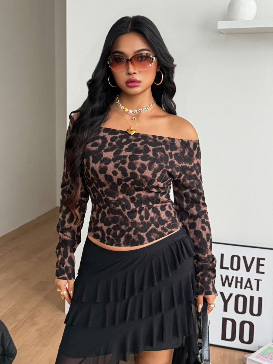 Women's striped off the shoulder long-sleeve top with contrast lace trim and ribbed knit texture.