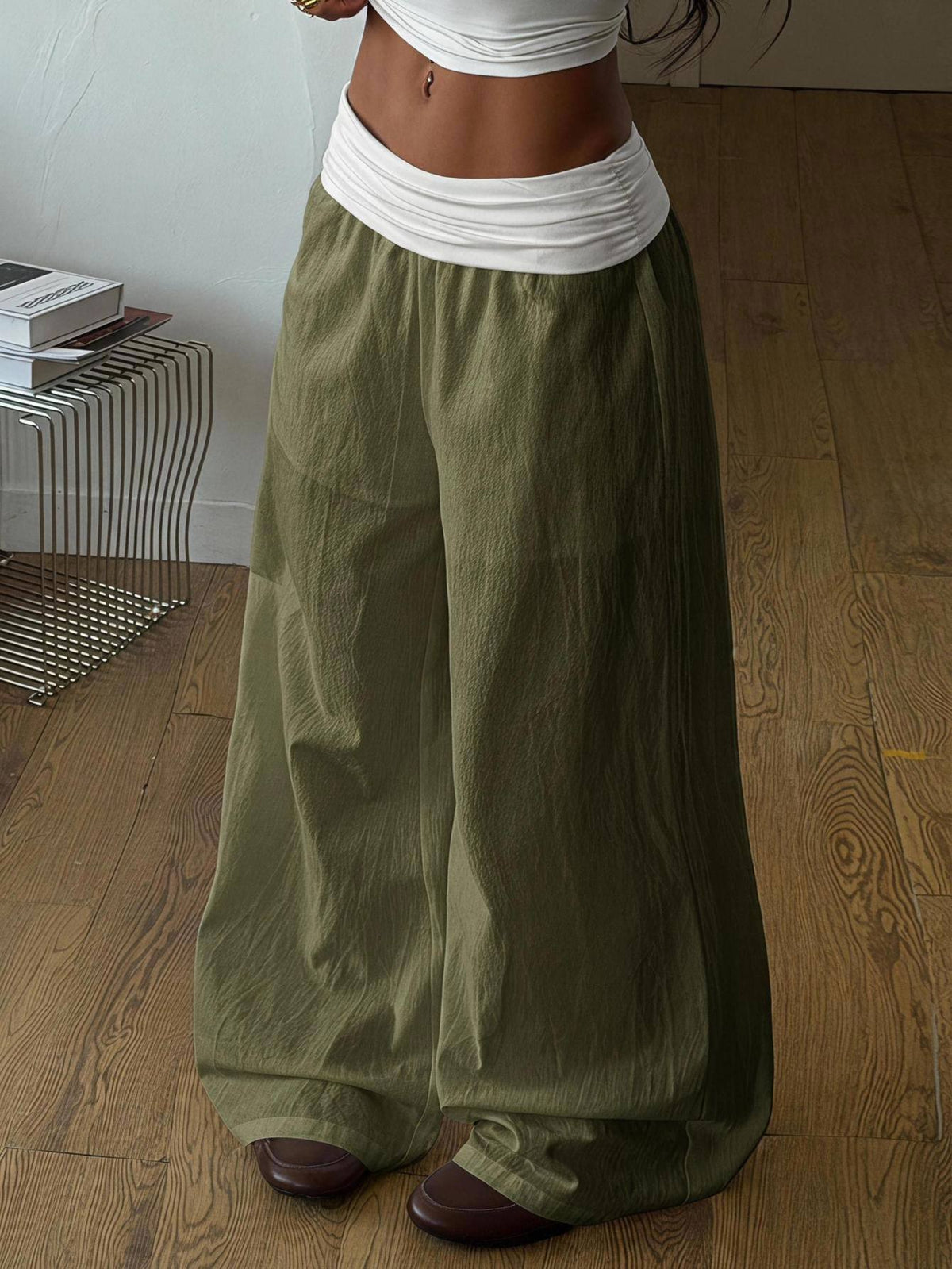 Women's plus size wide leg cotton pants featuring a relaxed loose fit and high waist design.