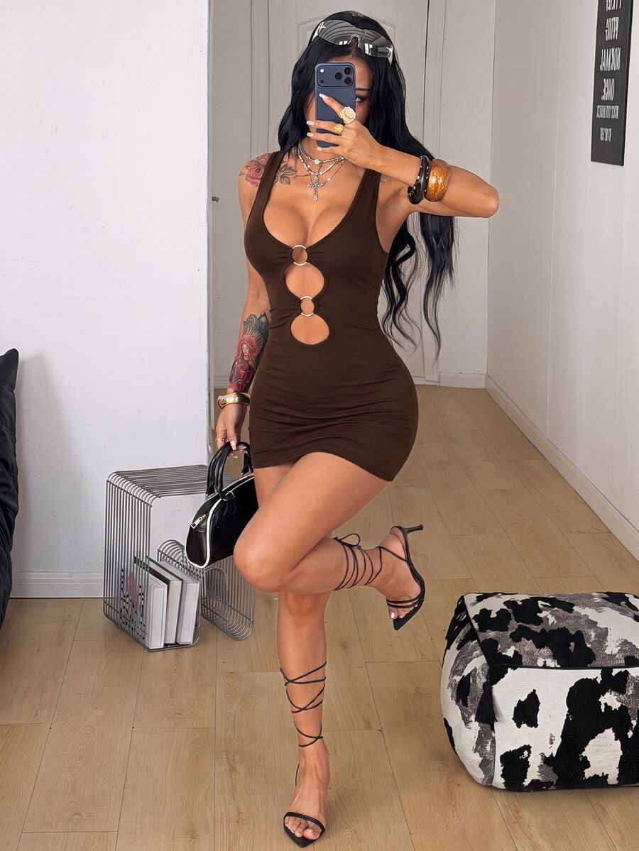 Women's slim fit cutout mini dress with scoop neck and metal buckle detail with arm sleeves