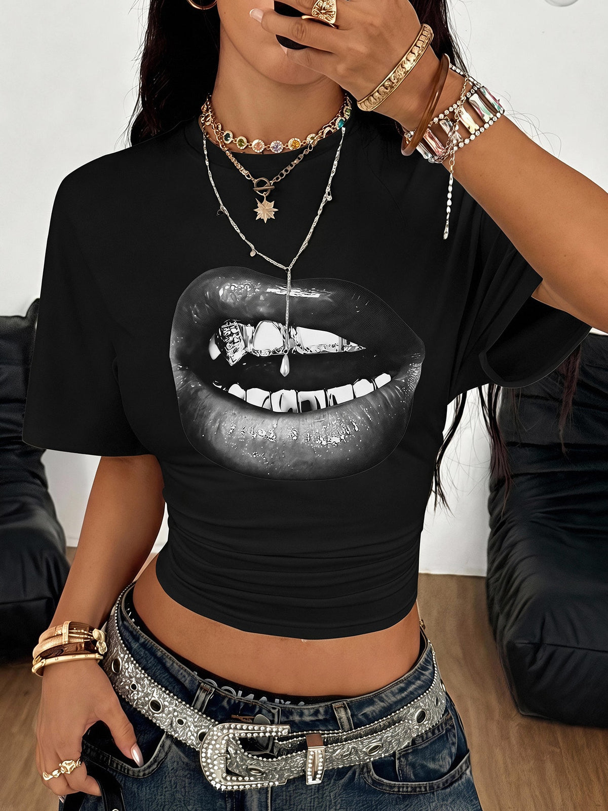 Women's striped short sleeve t-shirt featuring a casual drop shoulder design and round neckline.