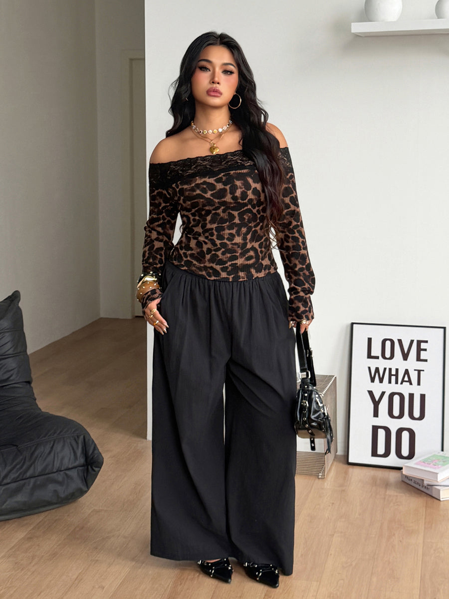 Women's striped off the shoulder long-sleeve top with contrast lace trim and ribbed knit texture.