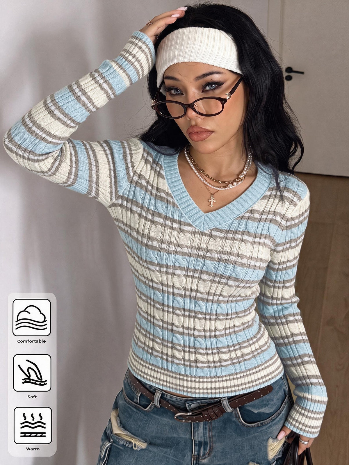 Women's slim fit cable-knit sweater with a V-neckline and long sleeves in solid green rib knit fabric.