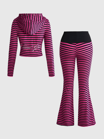 Women's pink striped two-piece set featuring a long sleeve hooded crop top with front zipper and matching extra long flare pants.