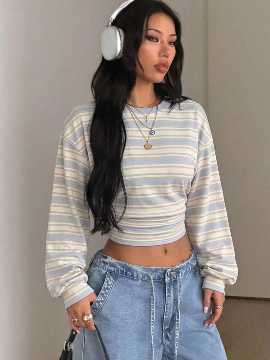 Women's brown waist-cinching sweatshirt featuring a round neck, drop shoulder long sleeves, and rib-knit cuffs.