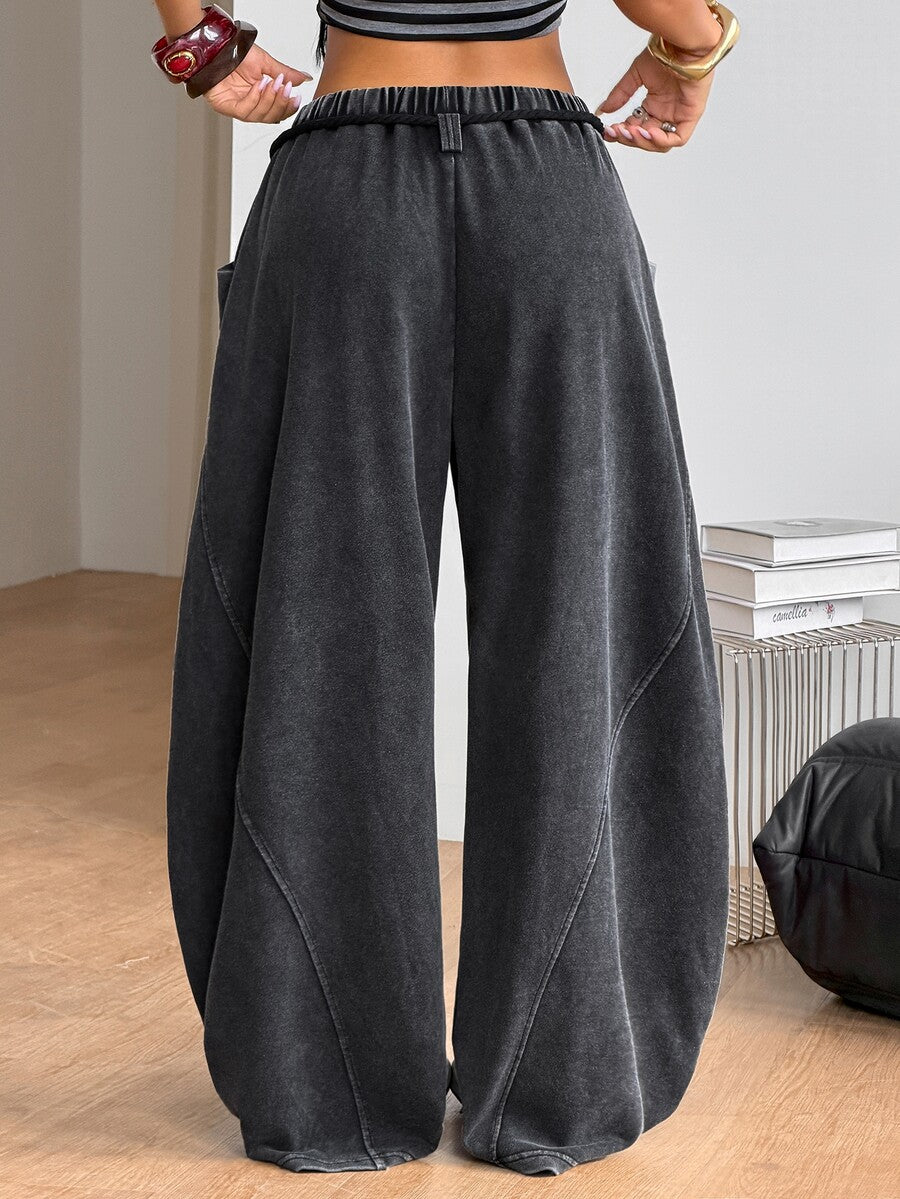 Women's casual grey plaid sweatpants featuring an elastic drawstring waistband, side pockets, and a relaxed loose fit.