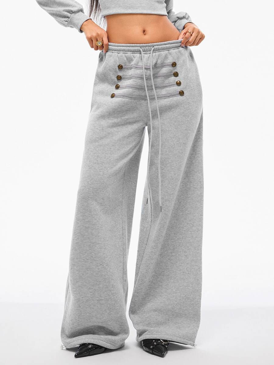 Women's wide leg trousers with a tree branch graphic pattern, loose fit, and mid-rise waist in woven fabric.