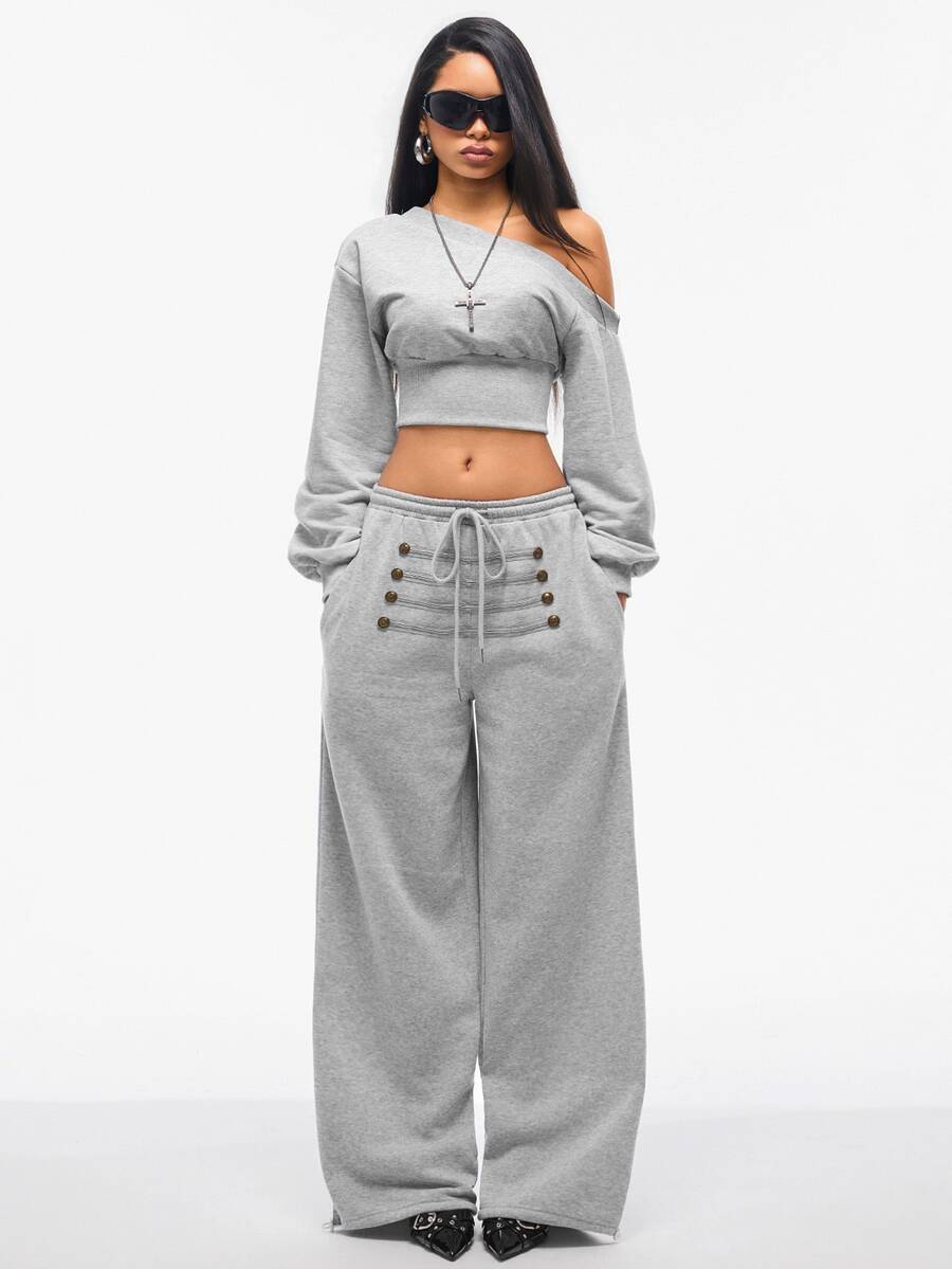 Women's wide leg trousers with a tree branch graphic pattern, loose fit, and mid-rise waist in woven fabric.