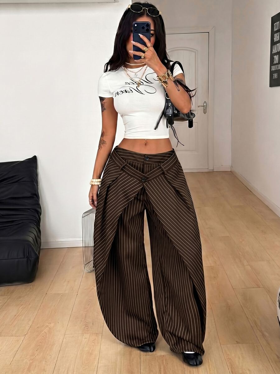 Women's loose fit pleated wide leg pants in royal blue pinstripe woven fabric with zipper fly closure.