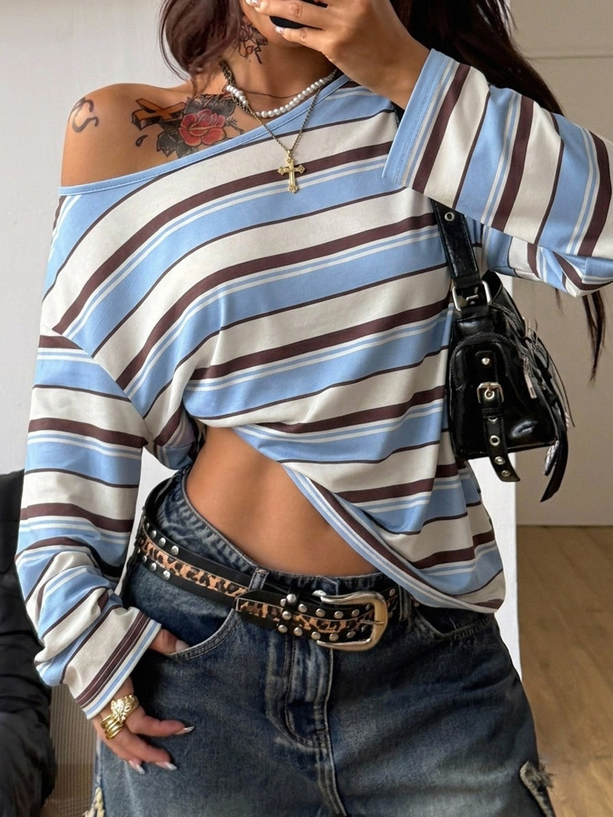 Women's brown striped boat neck long sleeve raglan T-shirt with a loose casual fit
