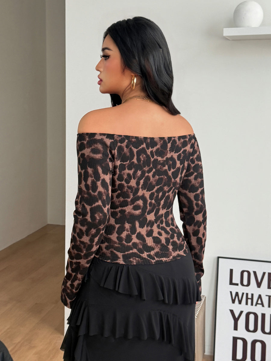 Women's striped off the shoulder long-sleeve top with contrast lace trim and ribbed knit texture.
