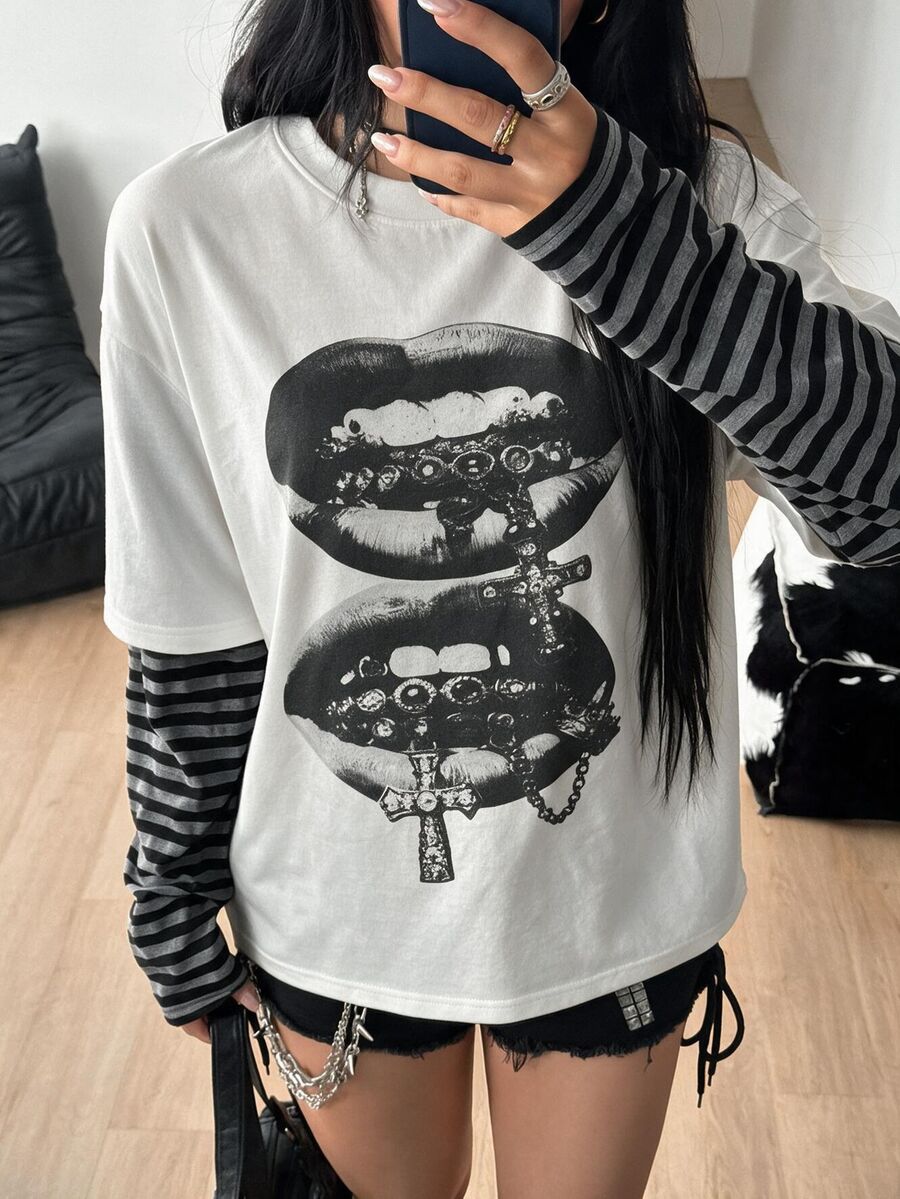 Women's casual graphic long sleeve t-shirt with a round neck, drop shoulder sleeves, and loose relaxed fit.
