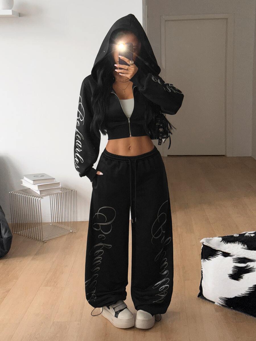 Women's wide leg trousers with a tree branch graphic pattern, loose fit, and mid-rise waist in woven fabric.