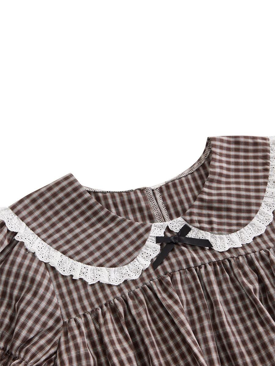 Women's plaid mini dress featuring a contrast lace Peter Pan collar, front bow accent, and short puff sleeves in a loose fit.