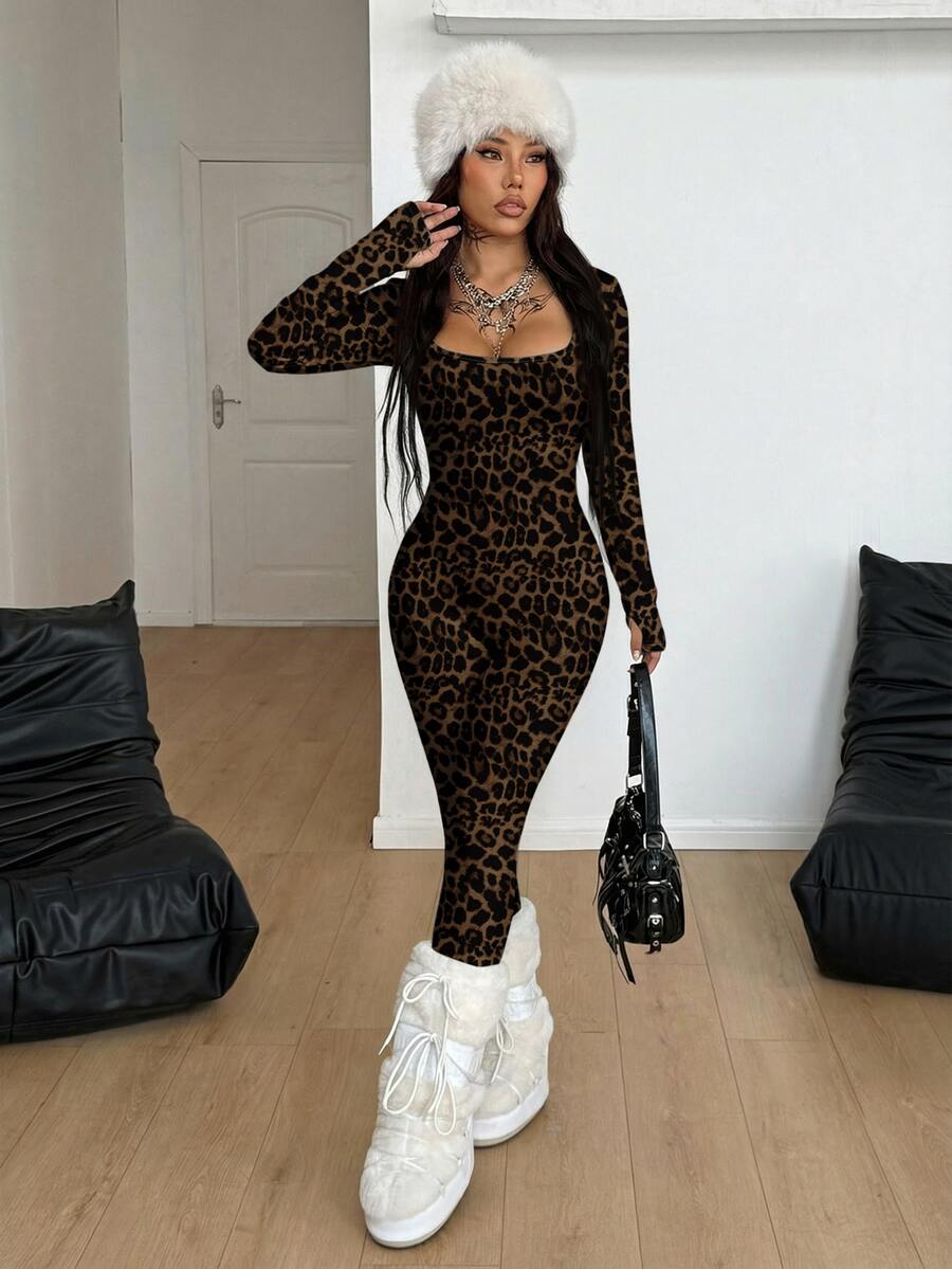 Black square neck long sleeve sport jumpsuit in rib-knit fabric with slim fit unitard silhouette for women.