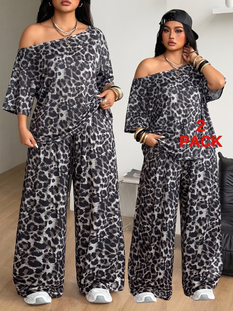 Women's two-piece lounge set featuring a loose drop shoulder asymmetrical neck short sleeve t-shirt and wide-leg knit pants with pockets.