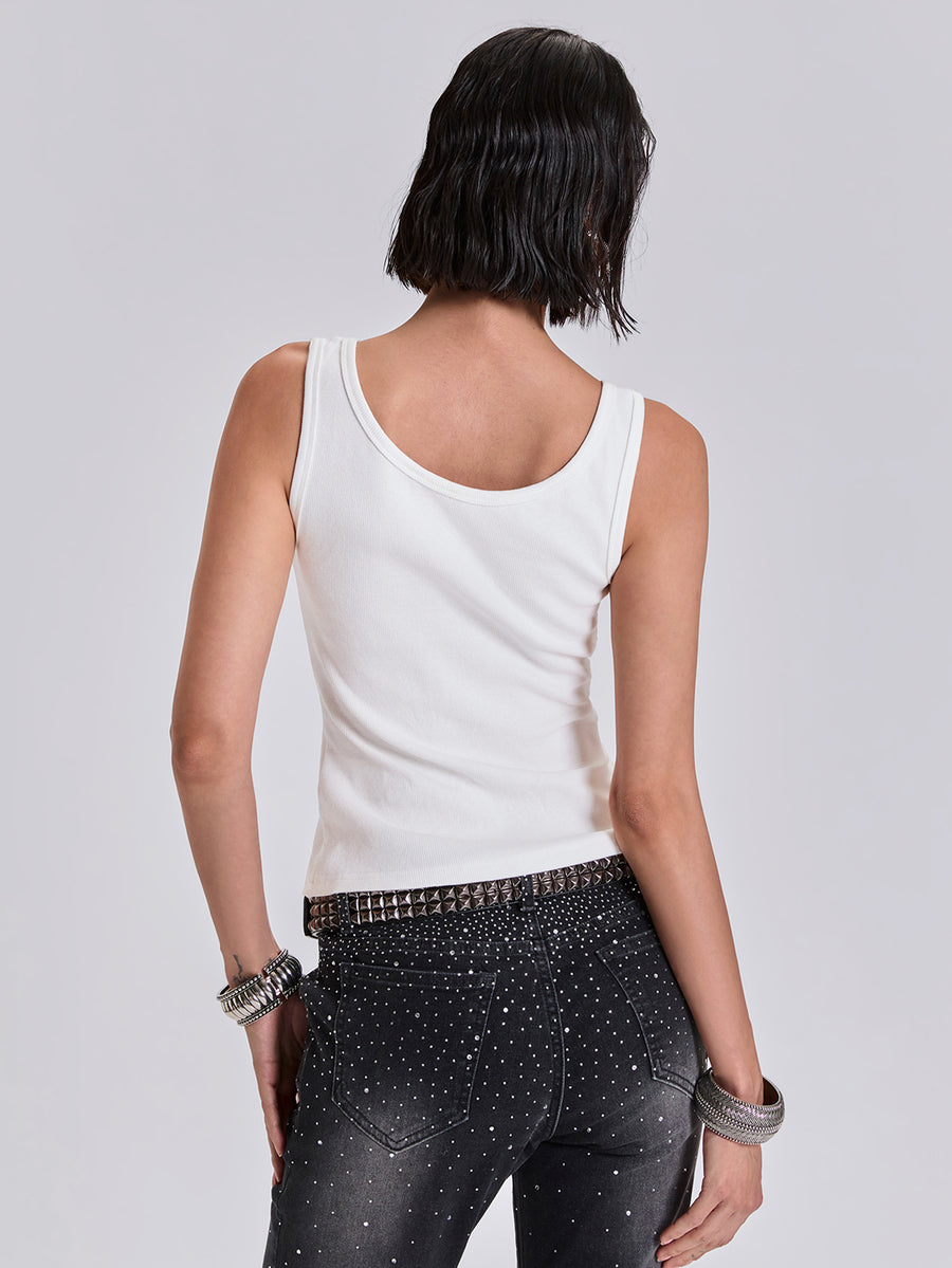 Women's slim fit ribbed scoop neck tank top featuring graphic print and rivet embellishments