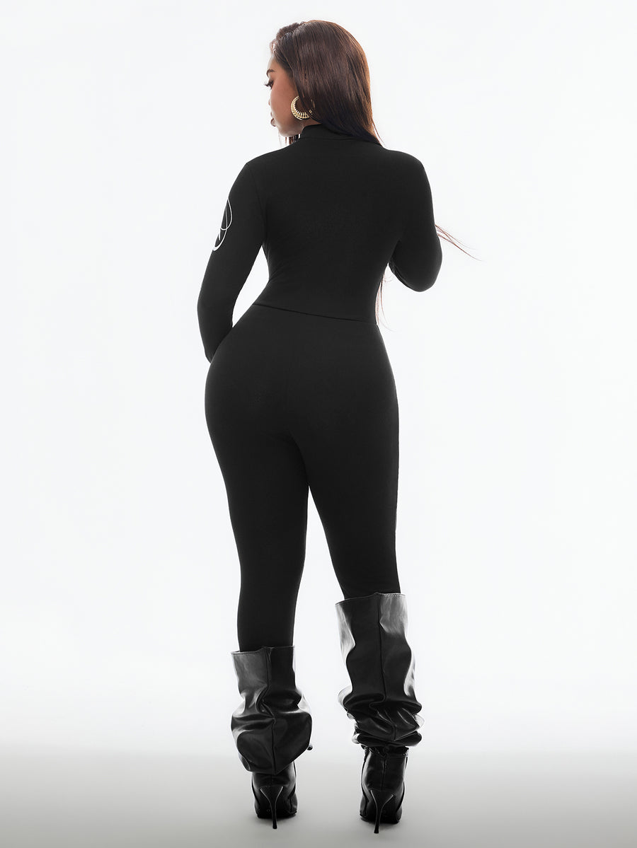 Fitted long sleeve unitard jumpsuit for women featuring a stand collar and front zipper closure in a solid color athletic style.