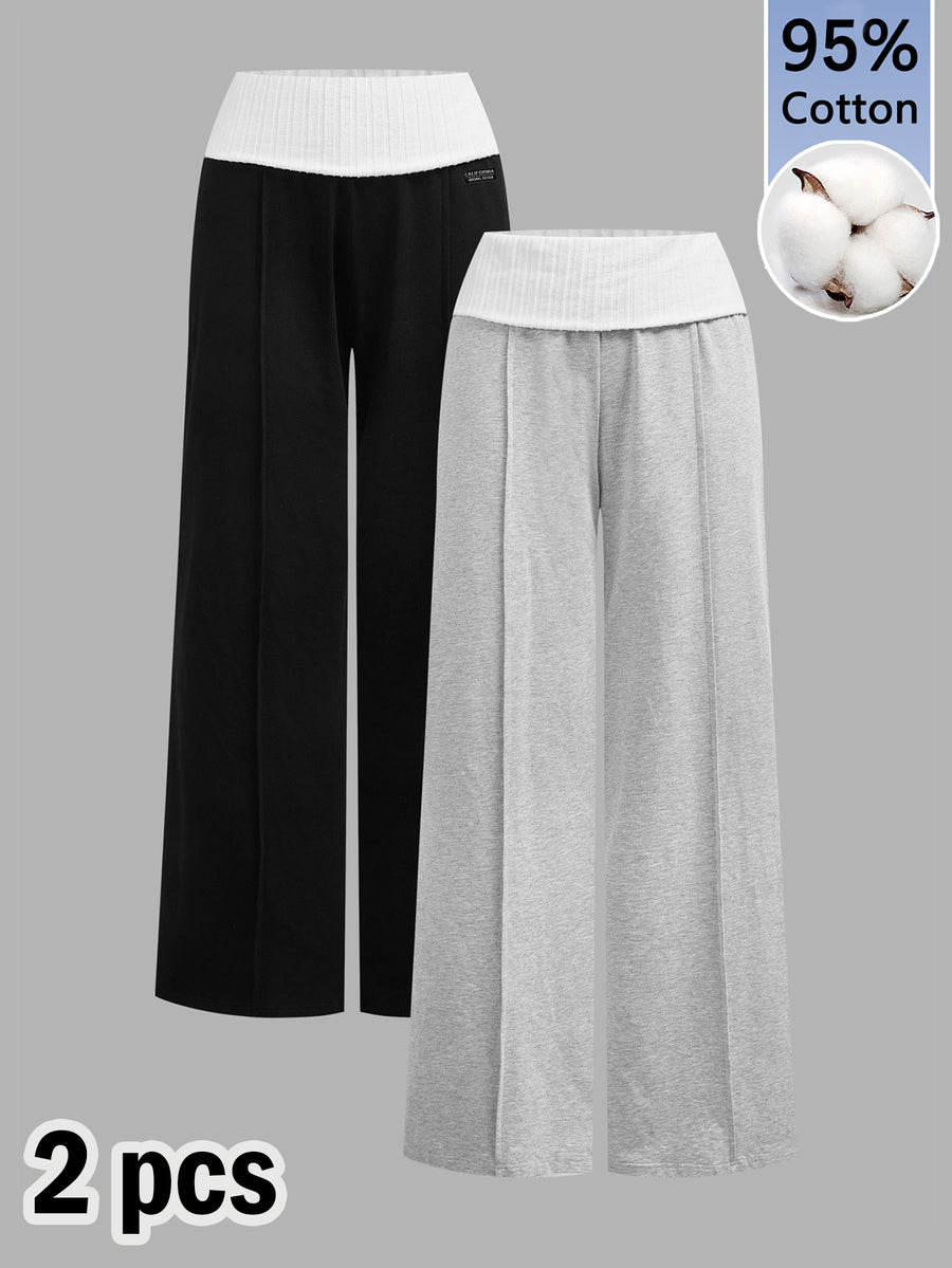 Women's wide leg flare lounge pants made of 95% cotton with a low elastic waistband and extra long hem.
