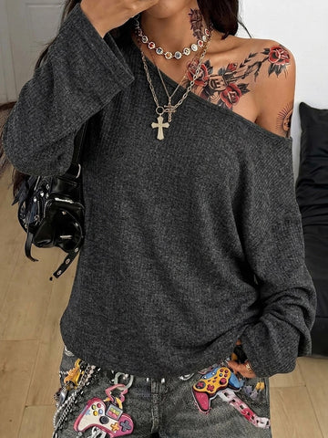 Women's off the shoulder long sleeve t-shirt featuring an asymmetrical neckline and loose fit in soft knitted fabric.