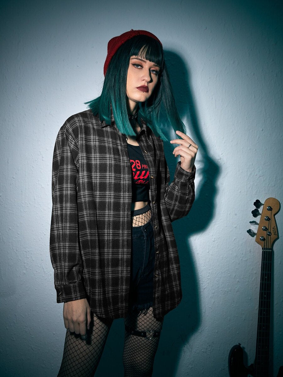 Women's black and white plaid button front shirt with long drop shoulder sleeves and an oversized fit.