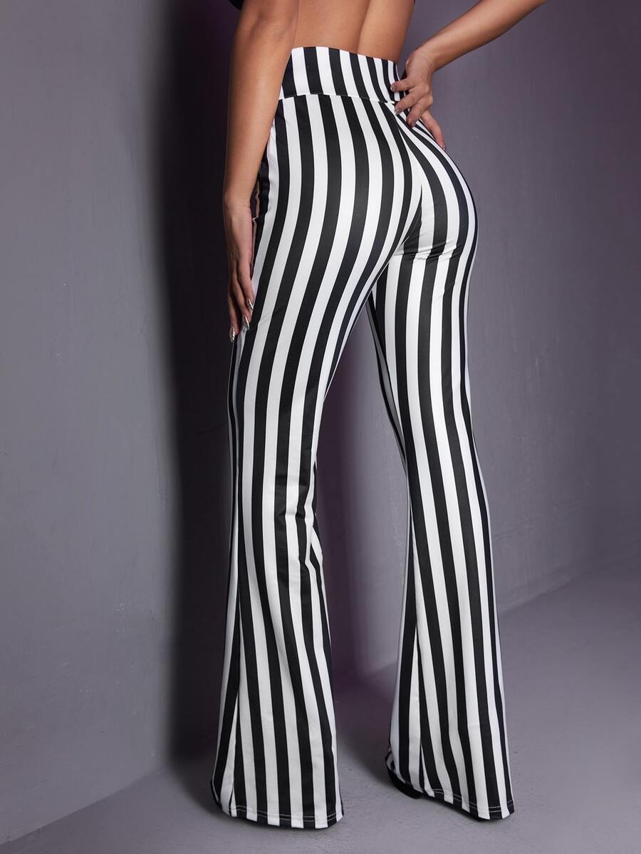 Women's black and white striped flare leg pants featuring a high elastic waist and extra long cut.