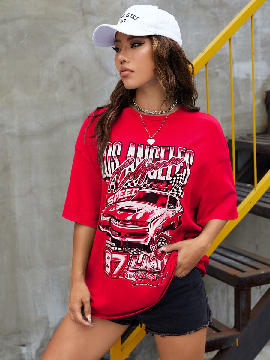 Red oversized t-shirt with letter graphic print and drop shoulder half sleeves.