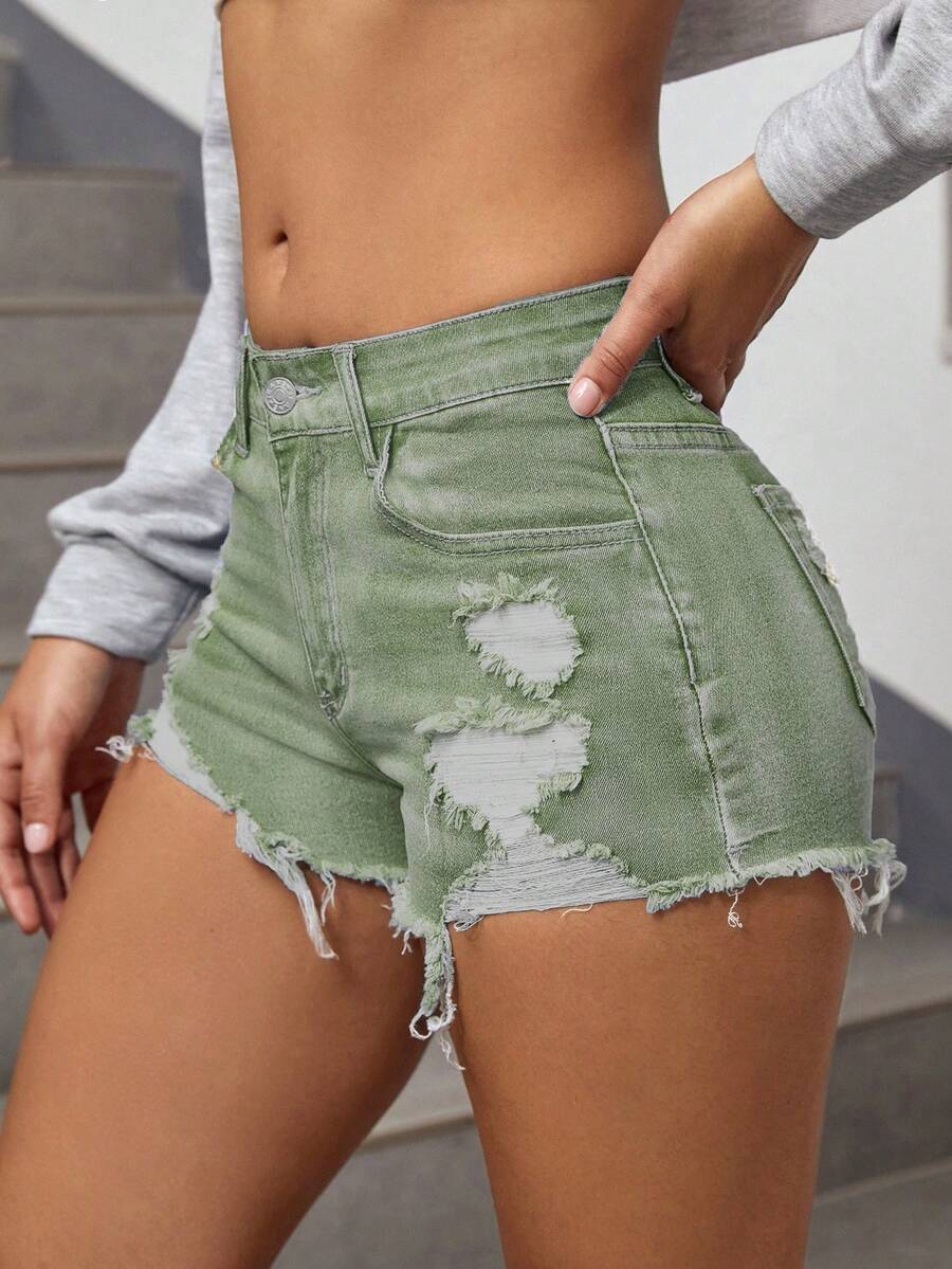 Women's solid color shorts with zipper fly, button closure, pockets, ripped details, and raw hem in a casual straight-leg short length