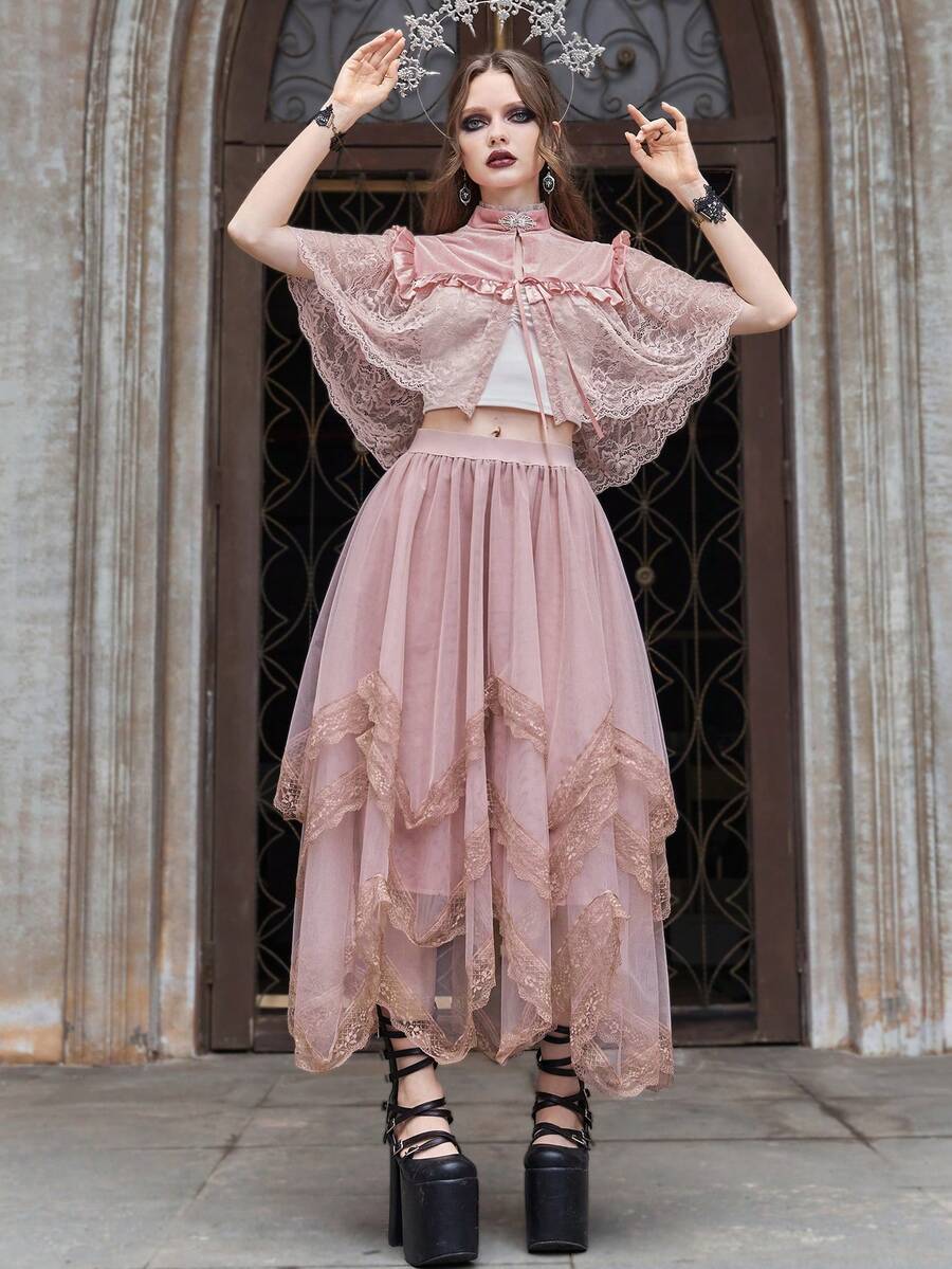 Women's asymmetrical high-waist mesh long skirt featuring contrast lace trim and a tiered A-line silhouette.