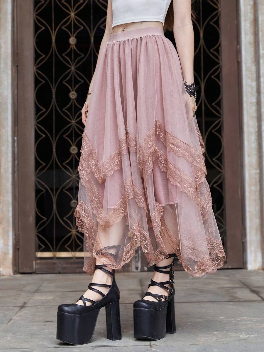 Women's asymmetrical high-waist mesh long skirt featuring contrast lace trim and a tiered A-line silhouette.