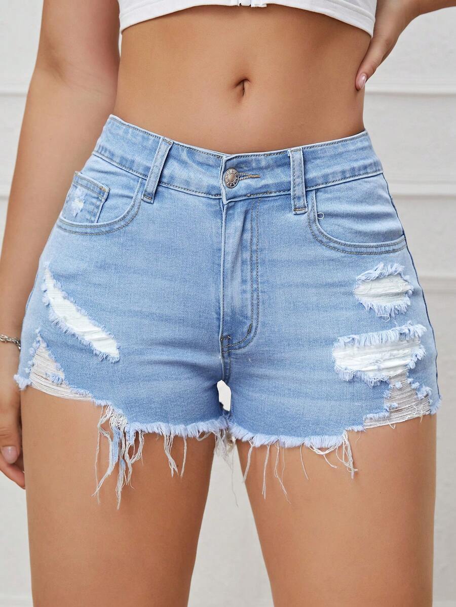 Women's solid color shorts with zipper fly, button closure, pockets, ripped details, and raw hem in a casual straight-leg short length
