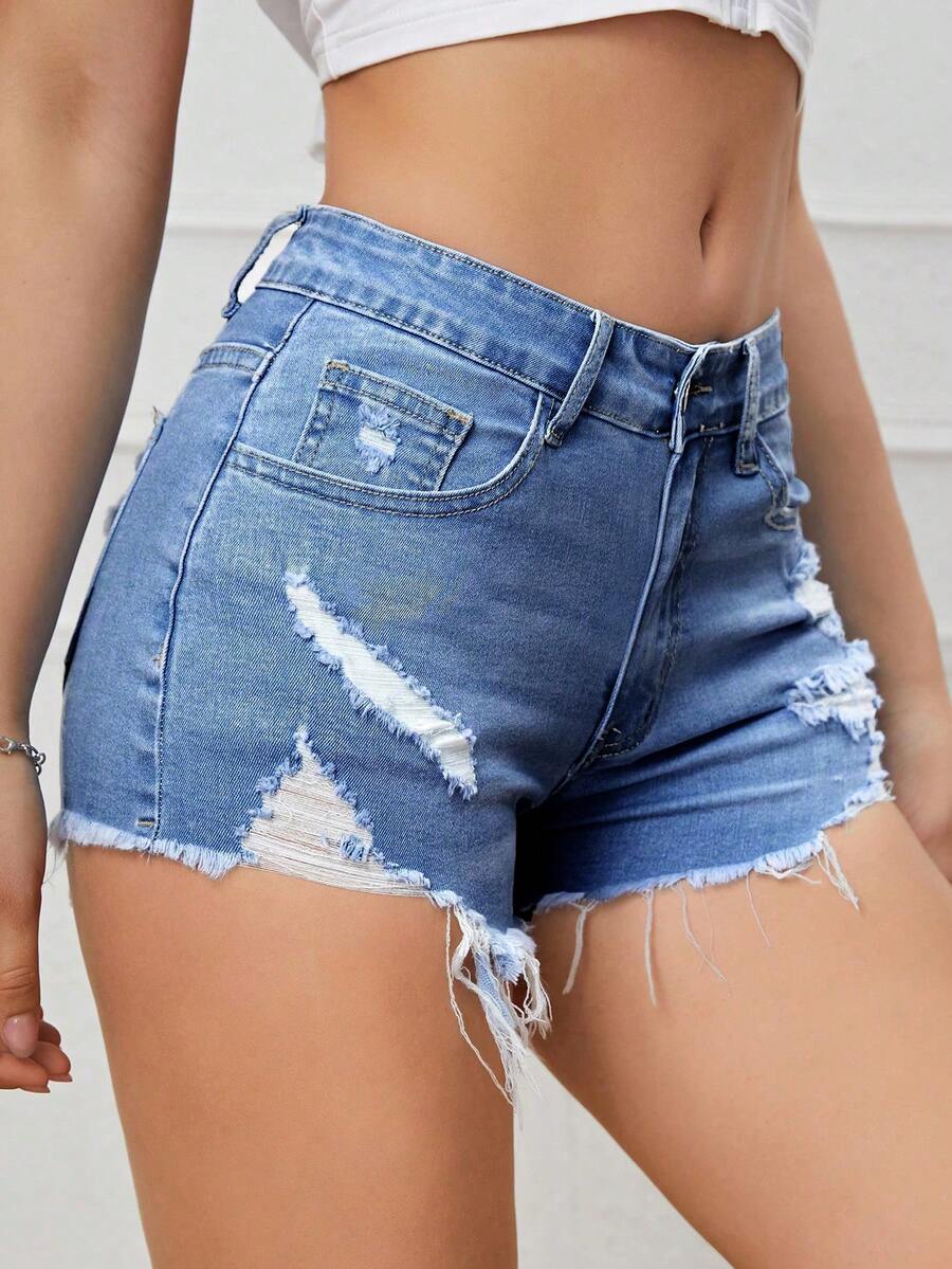 Women's solid color shorts with zipper fly, button closure, pockets, ripped details, and raw hem in a casual straight-leg short length