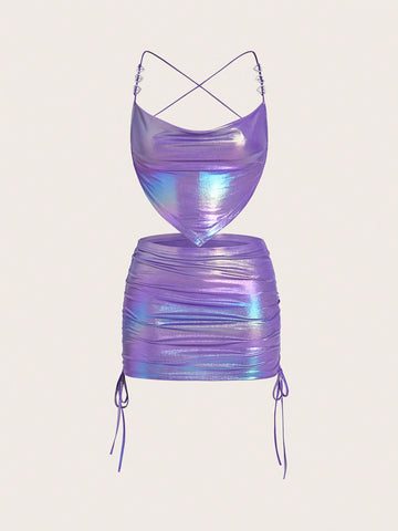 Holographic metallic two-piece set with a spaghetti strap hanky hem crop cami top and drawstring side skirt, featuring ruched details and rhinestone accents.
