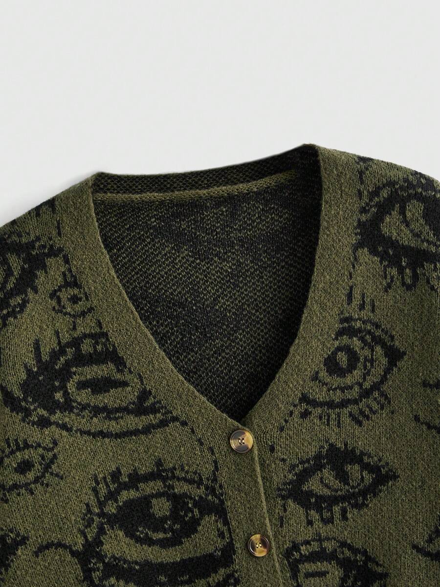 Army green oversized knit cardigan featuring front button closure, pockets, and a graphic eye pattern with drop shoulder long sleeves.