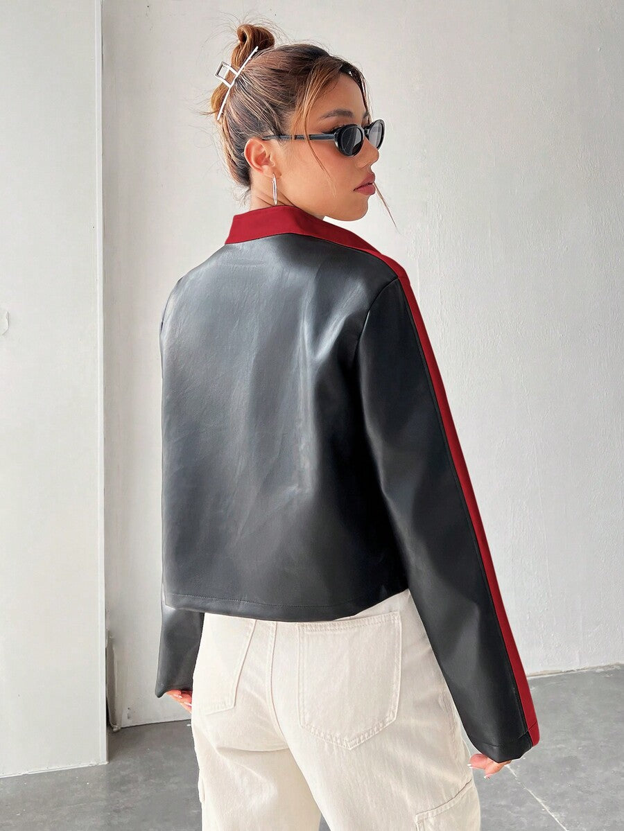 Women's black striped zip up crop jacket featuring a stand collar and long regular sleeves.