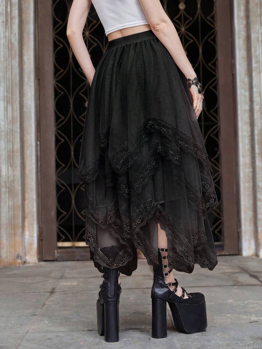 Women's asymmetrical high-waist mesh long skirt featuring contrast lace trim and a tiered A-line silhouette.