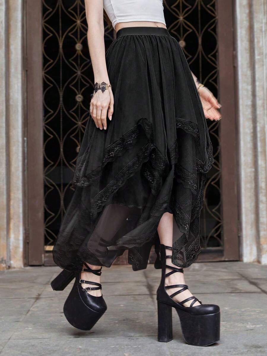 Women's asymmetrical high-waist mesh long skirt featuring contrast lace trim and a tiered A-line silhouette.