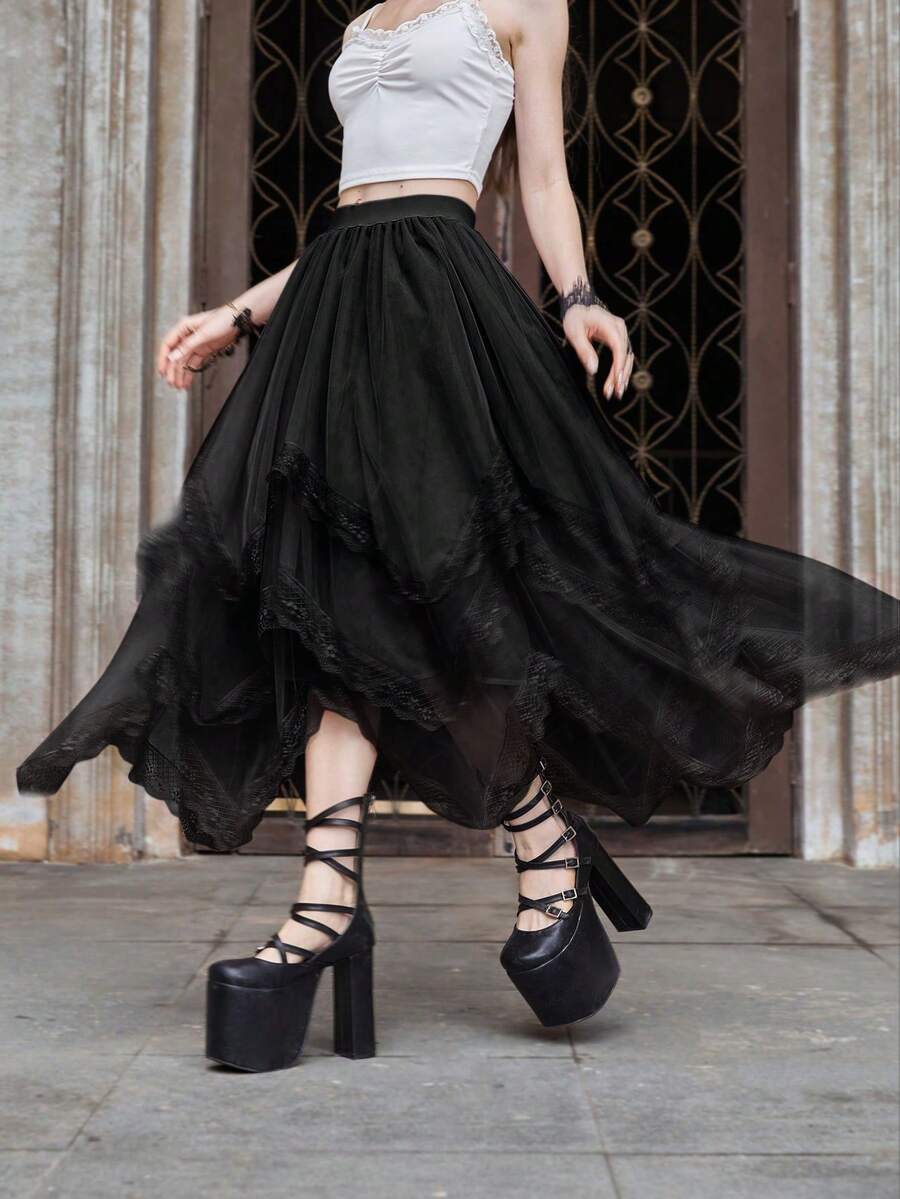 Women's asymmetrical high-waist mesh long skirt featuring contrast lace trim and a tiered A-line silhouette.