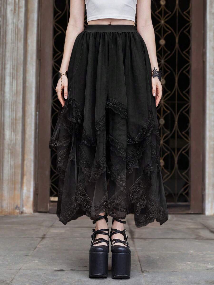 Women's asymmetrical high-waist mesh long skirt featuring contrast lace trim and a tiered A-line silhouette.