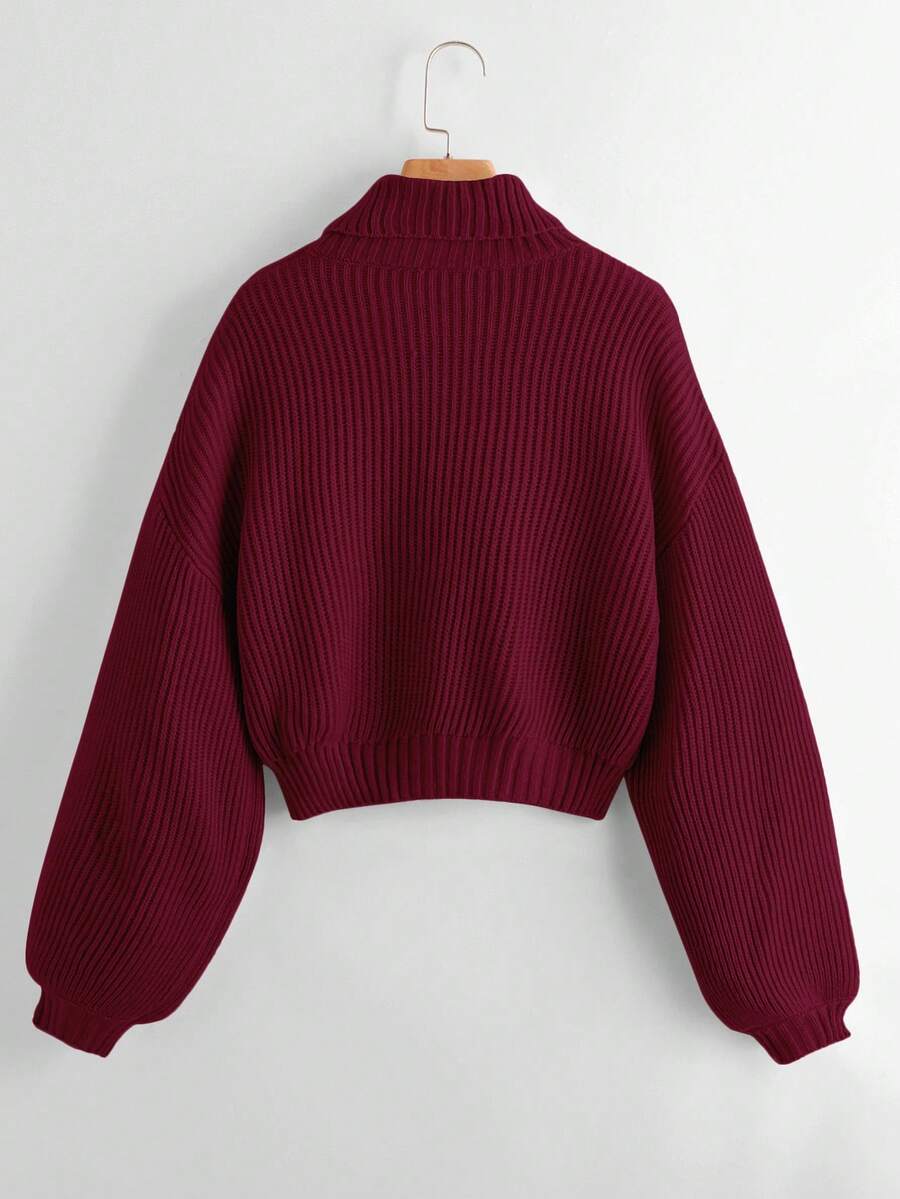 Women's rib-knit crop turtleneck sweater with long drop shoulder sleeves