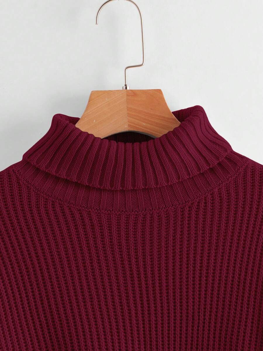 Women's rib-knit crop turtleneck sweater with long drop shoulder sleeves