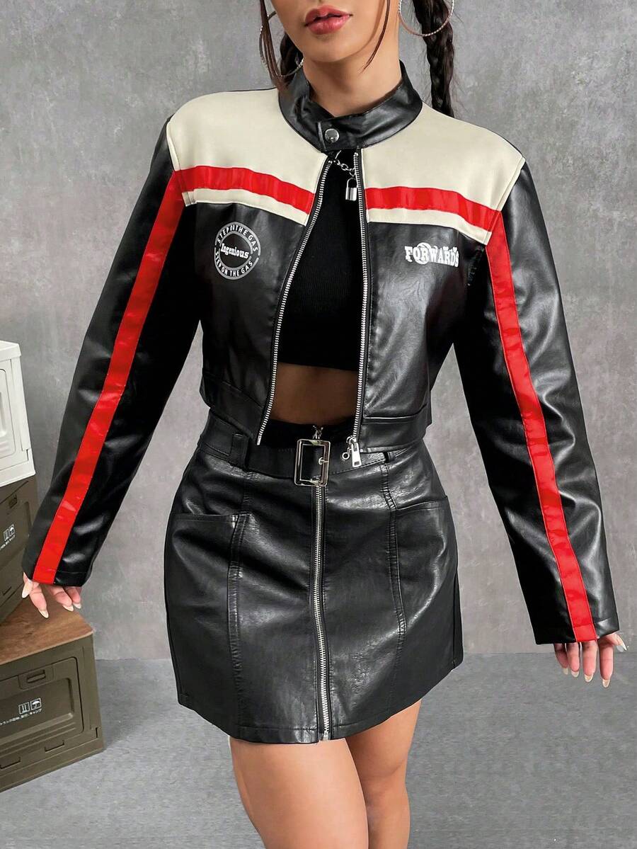 Women's colorblock crop PU leather bomber jacket featuring letter patch accents, a stand collar, and a full zip front closure.