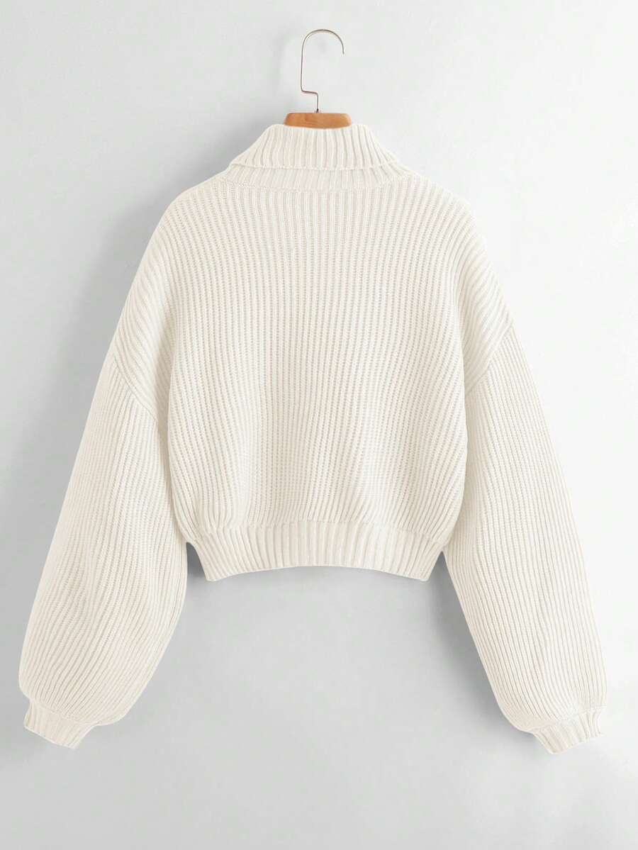Women's rib-knit crop turtleneck sweater with long drop shoulder sleeves