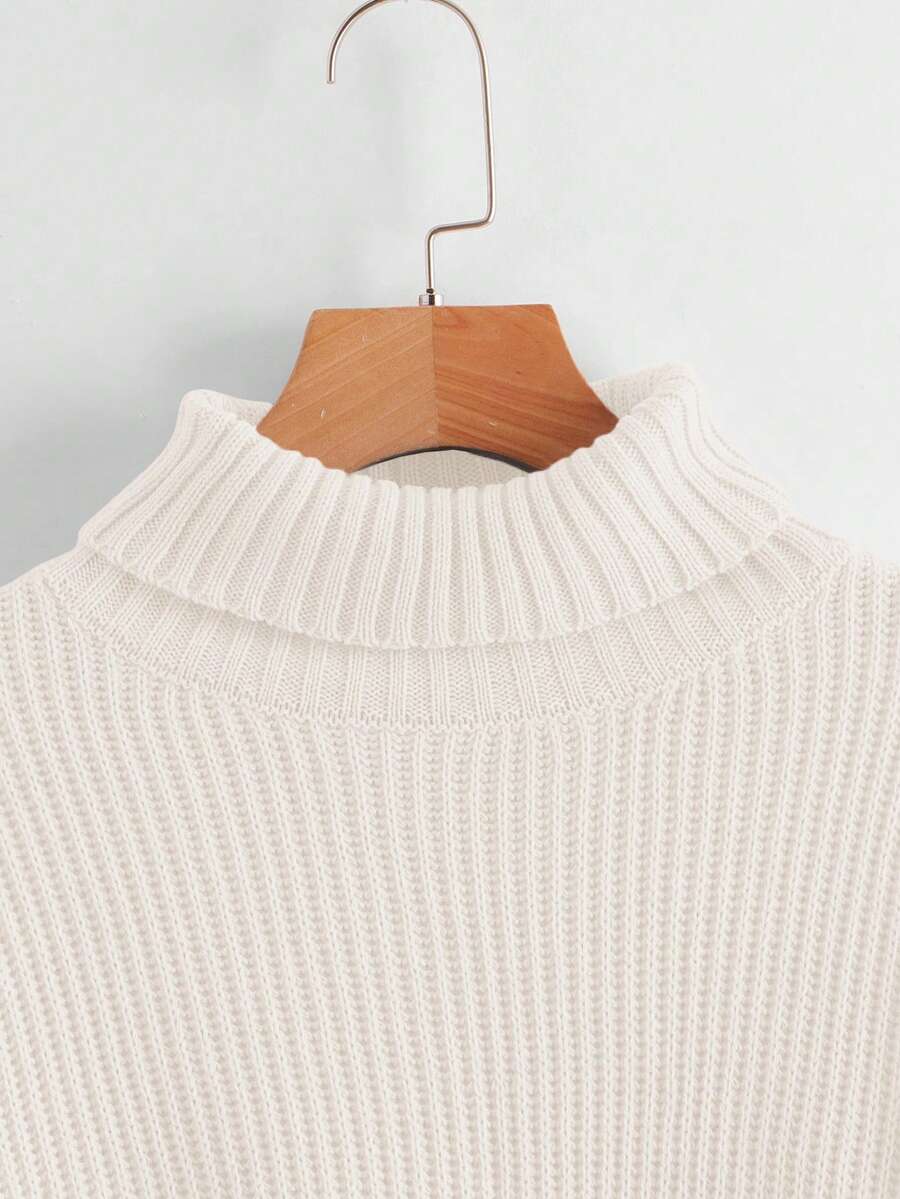 Women's rib-knit crop turtleneck sweater with long drop shoulder sleeves
