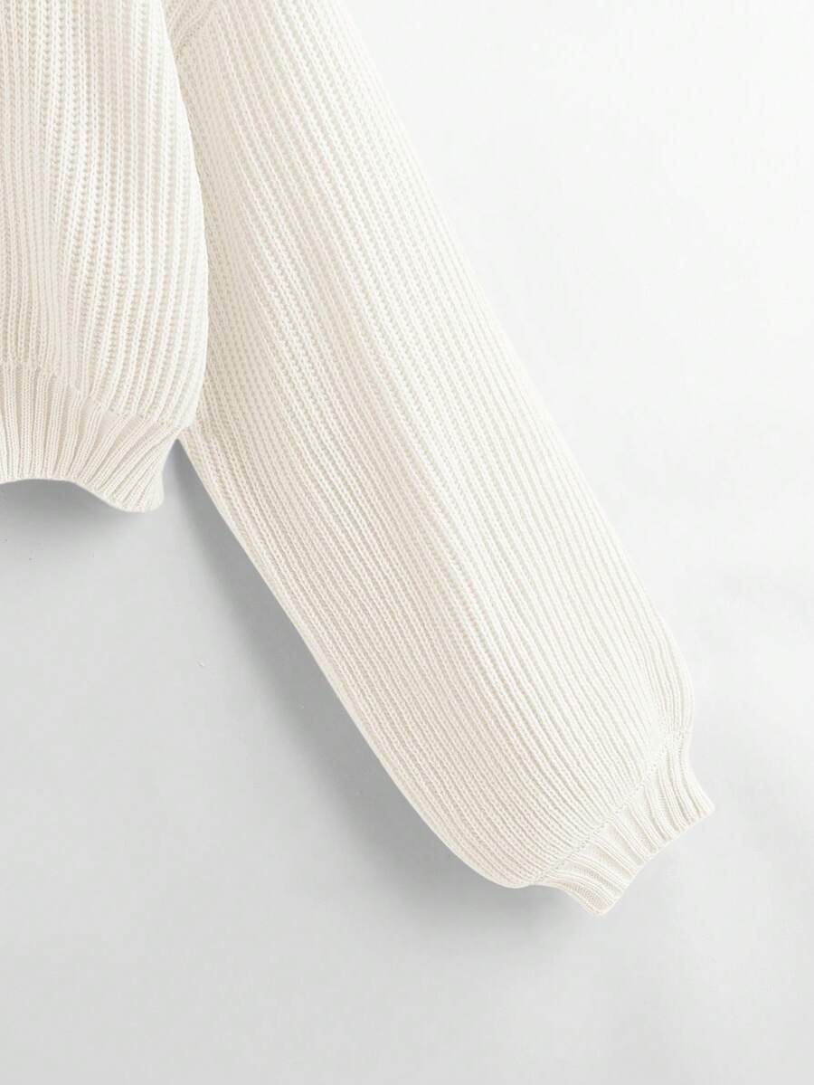 Women's rib-knit crop turtleneck sweater with long drop shoulder sleeves