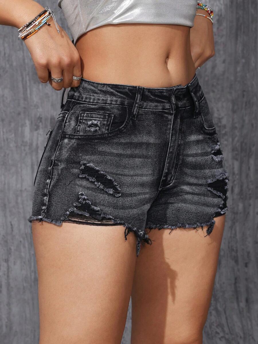 Women's solid color shorts with zipper fly, button closure, pockets, ripped details, and raw hem in a casual straight-leg short length