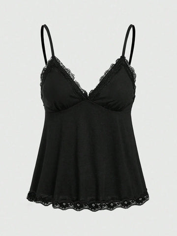 Women's spaghetti strap camisole with contrast lace patchwork, slim fit silhouette, plain design, and flared hem.