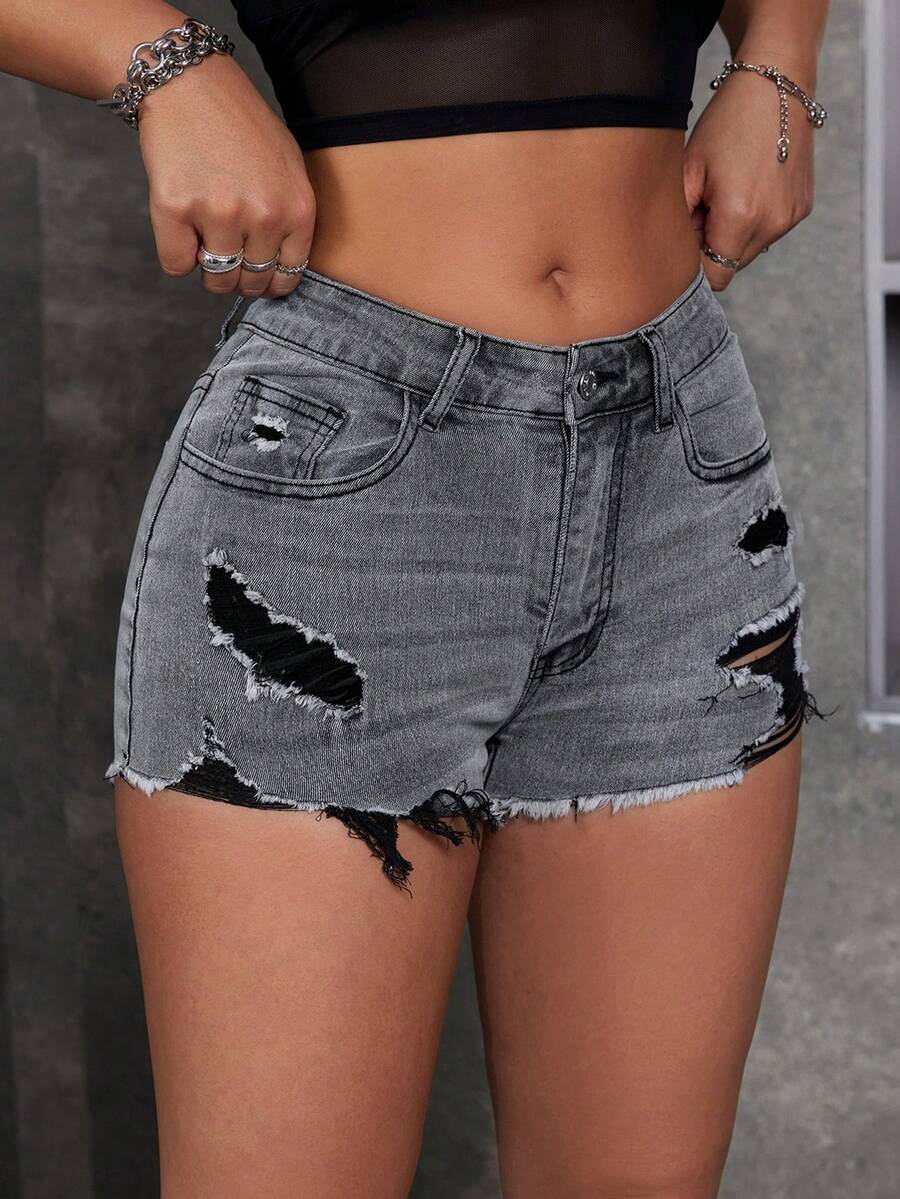 Women's solid color shorts with zipper fly, button closure, pockets, ripped details, and raw hem in a casual straight-leg short length